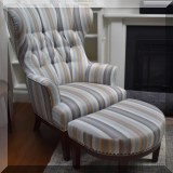 F20. Brunschwig & Fils tufted wing chair with matching ottoman. Chair: 45”h x 31”w x 36”d Ottoman: 15”h x 28”w x 19”d 